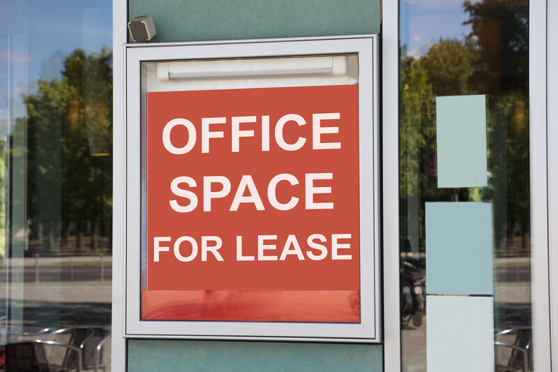 office space for lease sign in window_canstockphoto64871206